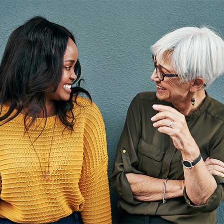 Friends discussing hearing loss